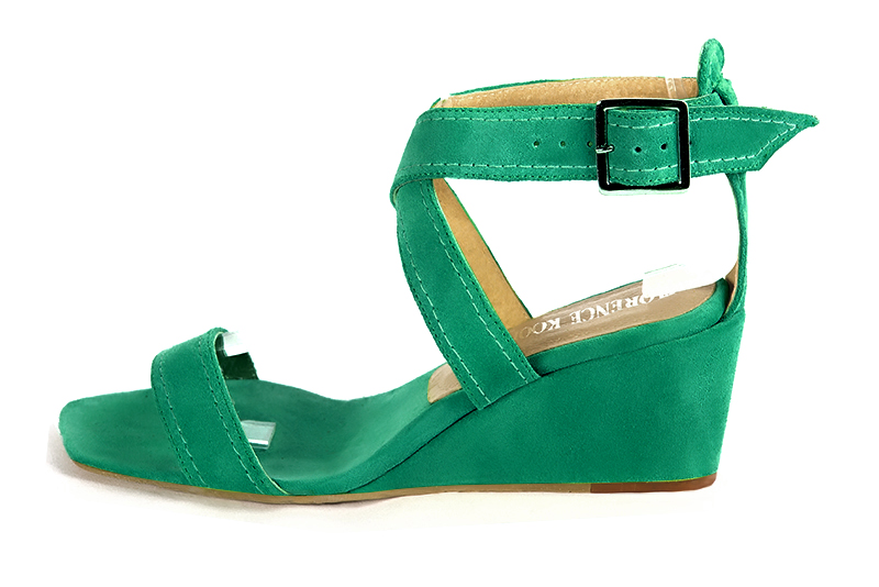 Emerald green women's fully open sandals, with crossed straps. Square toe. Medium wedge heels. Profile view - Florence KOOIJMAN